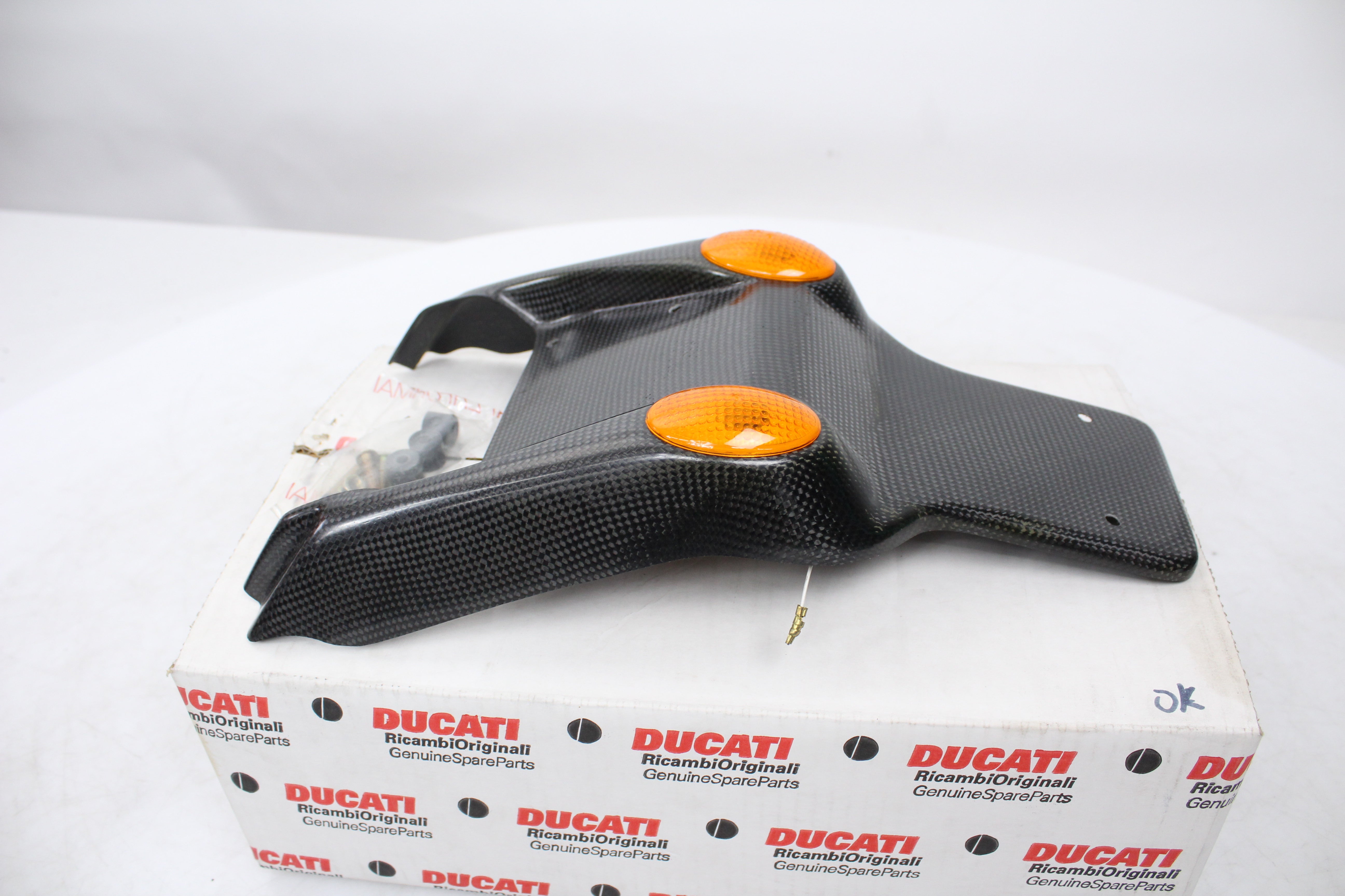 Ducati OEM, Rear Turn Signal Indicator fender carbon License Ducati Monster 400 94-97/ 600 94-98/ 900 98-99 OEM